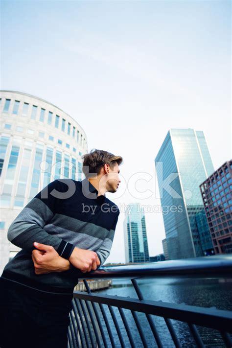 Young Man Standing On Bridge, London Stock Photo | Royalty-Free ...