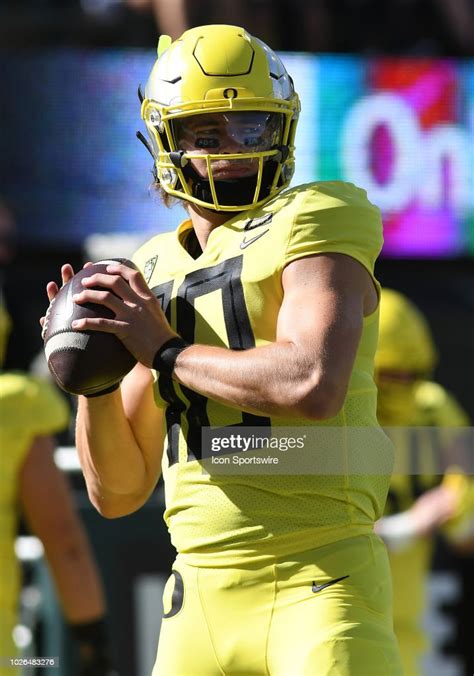 University Of Oregon Qb Justin Herbert Warms Up Prior To The Start Of