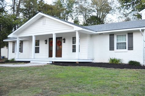 How We Transformed Our Basic Brick Ranch By Adding A New Front Porch