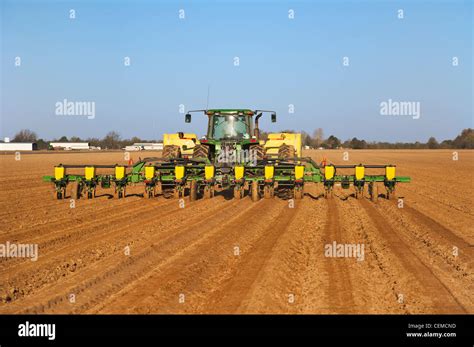 Agriculture A John Deere Tractor And Row Planter Plant Grain Corn