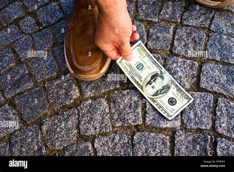 Finding Money On Ground High Resolution Stock Photography And Images