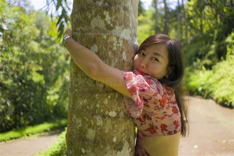 Summer Lifestyle Portrait Of Young Beautiful And Playful Asian Chinese