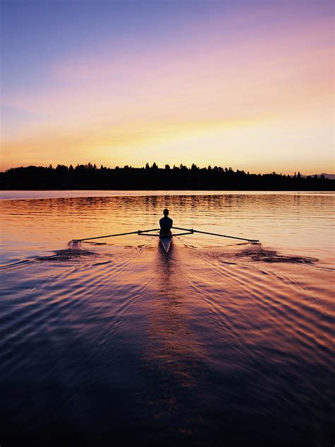 Female Rowing Single Scull Sunrise By Thomas Barwick