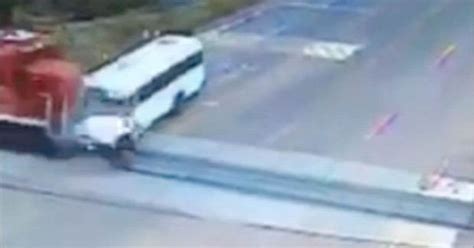 Watch Tragic Moment Train Smashes Into Bus In Horrifying Collision