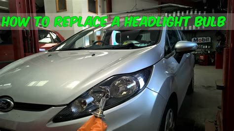 How To Replace A Headlight Bulb In A Ford Fiesta Youtube