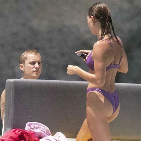 Justin Bieber Ditches The Shirt As He Embraces Bikini Clad Wife Hailey