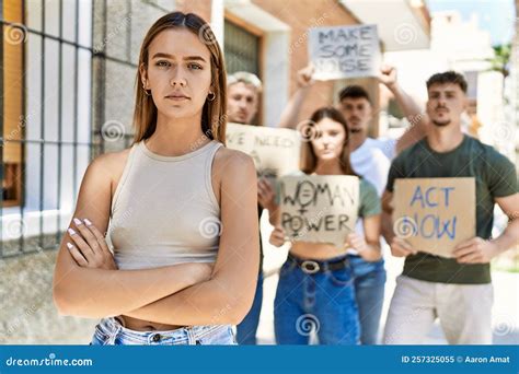 Young Hispanic Activist Woman With Arms Crossed Gesture Standing With A