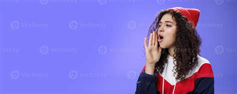 Portrait of worried sister calling sibling outdoors open mouth looking