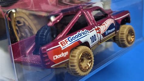 Машинка Базова Hot Wheels Dodge D Baja Blazers HKG Pink купити в інтернет