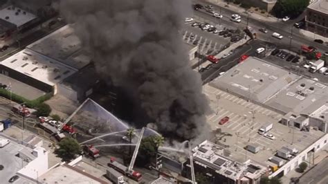 Firefighters respond to flames and explosions at downtown LA business ...