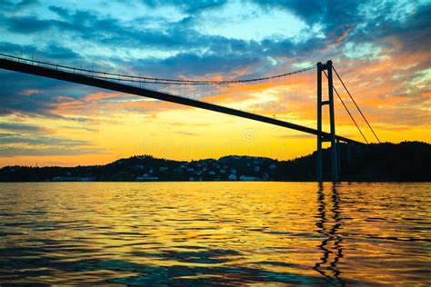 Sunset Over Suspension Bridge In Bergen, Norway Stock Photo - Image ...