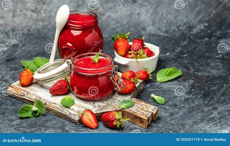 Strawberry Jam In The Glass Jar Homemade Strawberry Marmelade And Fruits On A Dark Background