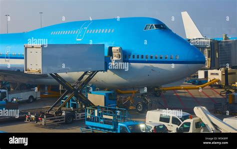 Airplane near the terminal in an airport cockpit Stock Photo - Alamy