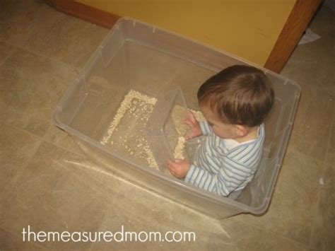 A Baby Sensory Play Activity Baby In The Oats The Measured Mom