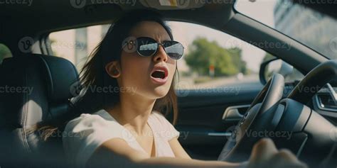 Rude Driver Furious Young Woman Shouting And Gesturing While Driving A