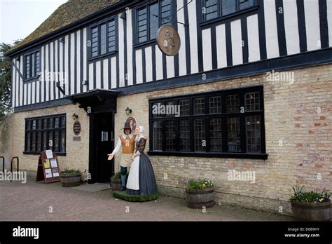 Figures Of Man And Woman Outside Oliver Cromwell House In Ely