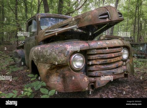 Rusty Old Truck In A Junkyard Stock Photo Alamy