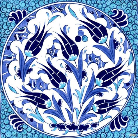 A Blue And White Plate With Birds On It S Side Surrounded By Waves