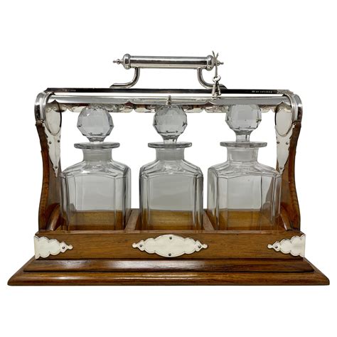 Antique English Decanter Set And Stand Tantalus At 1stdibs Antique Tantalus Decanter Set