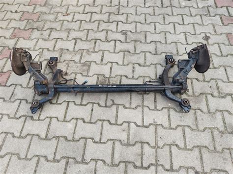 BELKA ZAWIESZENIA TYŁ TYLNA OŚ PEUGEOT 206 HB 3D 12854408147