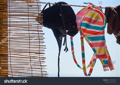 Colorful Striped Bikini Hanging Out Dry Stock Photo Edit Now 1747916873