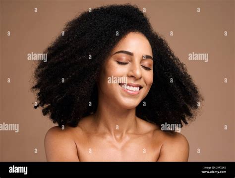 African hair, afro and face of model girl happy with shampoo hair care ...