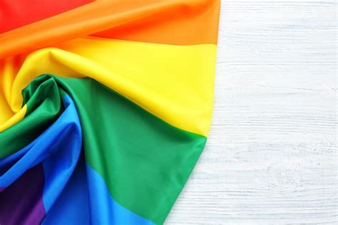 Premium Photo Rainbow Gay Flag On Wooden Background