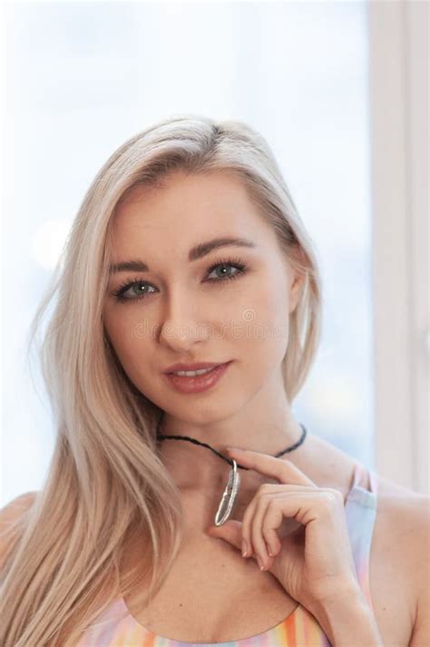 Portrait Of Pretty Blonde Girl In Colorful Hippie Top With Bohemian Accessories Stock Image