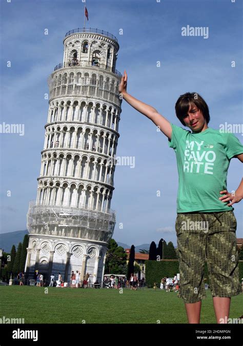 Pisa Tourist Supporting Leaning Tower Of Pisa Pisas Tourists