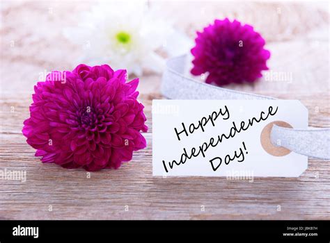 Background With Flowers And Label With Happy Independence Day Stock