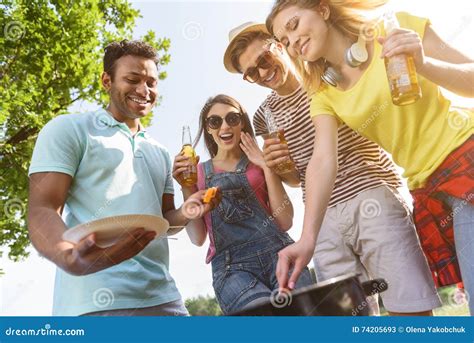 Cheerful Friends Eating Barbecue In Nature Stock Image Image Of