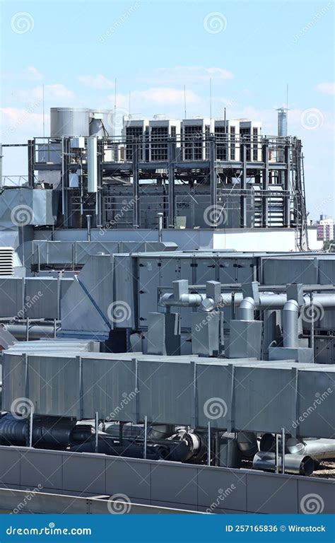 Vertical Shot Of A Ventilation System Of A Building Located On The Roof