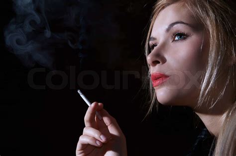 Cute Blonde Smoking Stock Image Colourbox