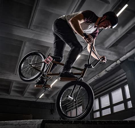 Premium Photo Professional Bmx Rider In Protective Helmet Performing