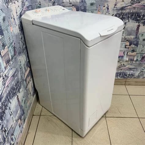 Electrolux EWT105410WT - Стиральные машины с вертикальной загрузкой