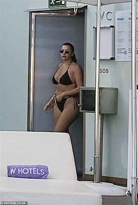 Imogen Thomas Flaunts Her Gorgeous Curves In A Tiny Black Bikini As She Soaks Up The Sun On