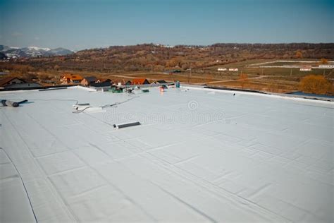 Flat Roof With Hot Air Welded Pvc Membrane Waterproofing For Ballasted System Stock Photo