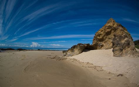 Wallpaper Clouds Sky Stones Sand Coast Strips X Wallup