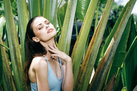 Woman Clean Skin Cosmetology Naked Shoulders And Green Palm Leaves Exotic Stock Image Image Of