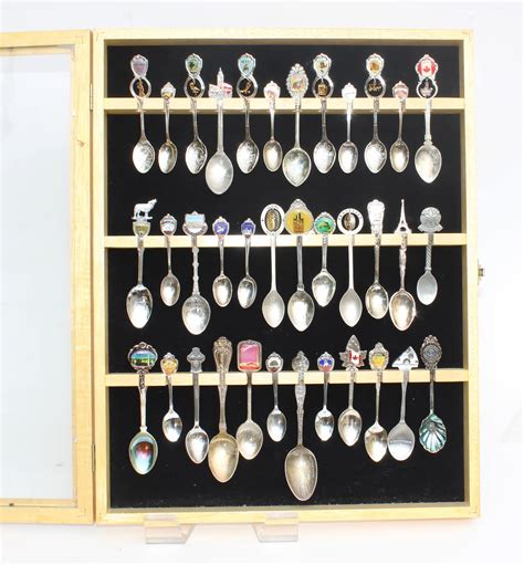 Collection of Vintage Souvenir Spoons in Glass Display Case | EBTH