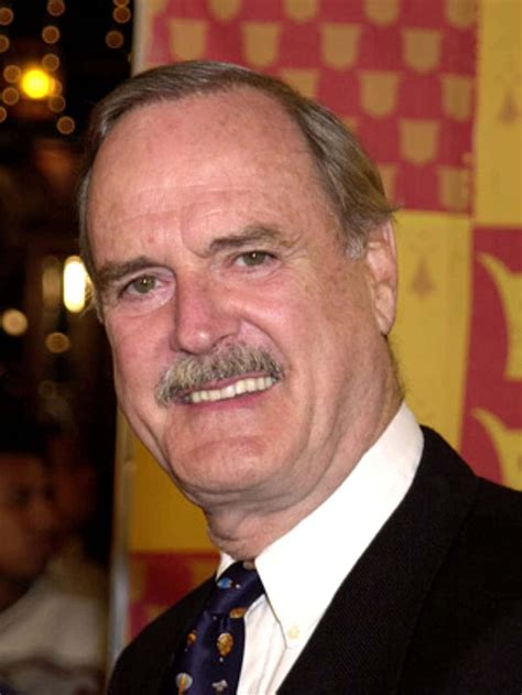 Download Portrait Of John Cleese Iconic British Comedian Wallpaper