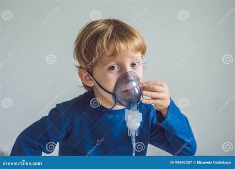 Boy Making Inhalation With A Nebulizer At Home Stock Image Image Of