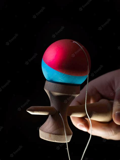 Premium Photo | Classic japanese game kendama on black background two