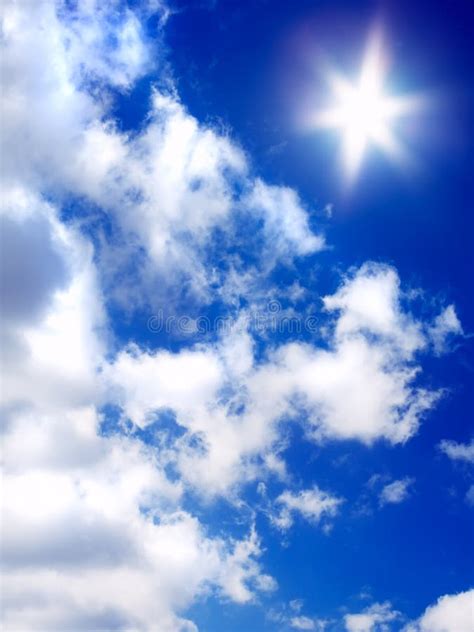 Sun and clouds on blue sky stock image. Image of image - 4802273