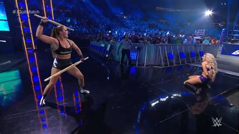 Watch Charlotte Flair Screams I Quit After Ronda Rousey Applies An