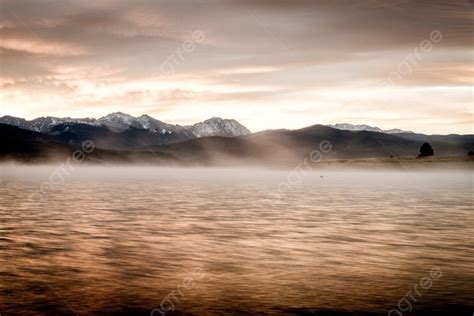 Sun Rising Behind Shadow Mountain Photo Background And Picture For Free