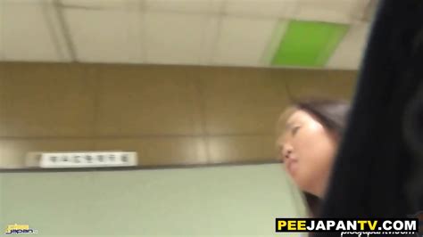 Cute Asian Babe Pisses On Subway