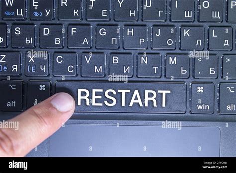 A Keyboard With A Labeled Button Restart Stock Photo Alamy