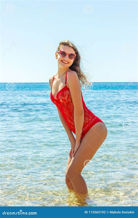 Beautiful Happy Smiling Woman Posing In Red Bikini At The Beach Stock Photo Image Of Pretty