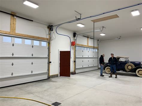 Amazing Garage 14′ Ceilings Insulated Drywalled Heated And Air